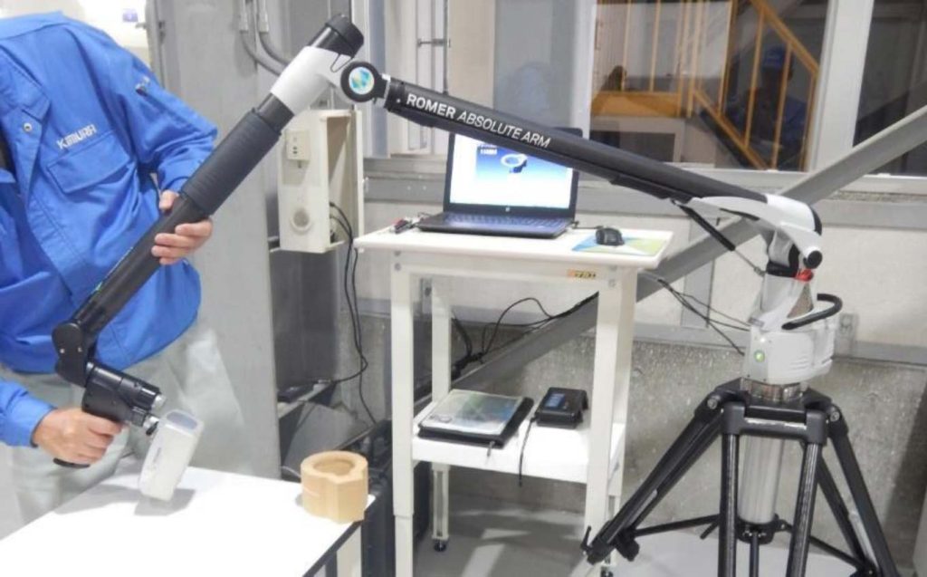 Technician scanning a part to create a 3D file